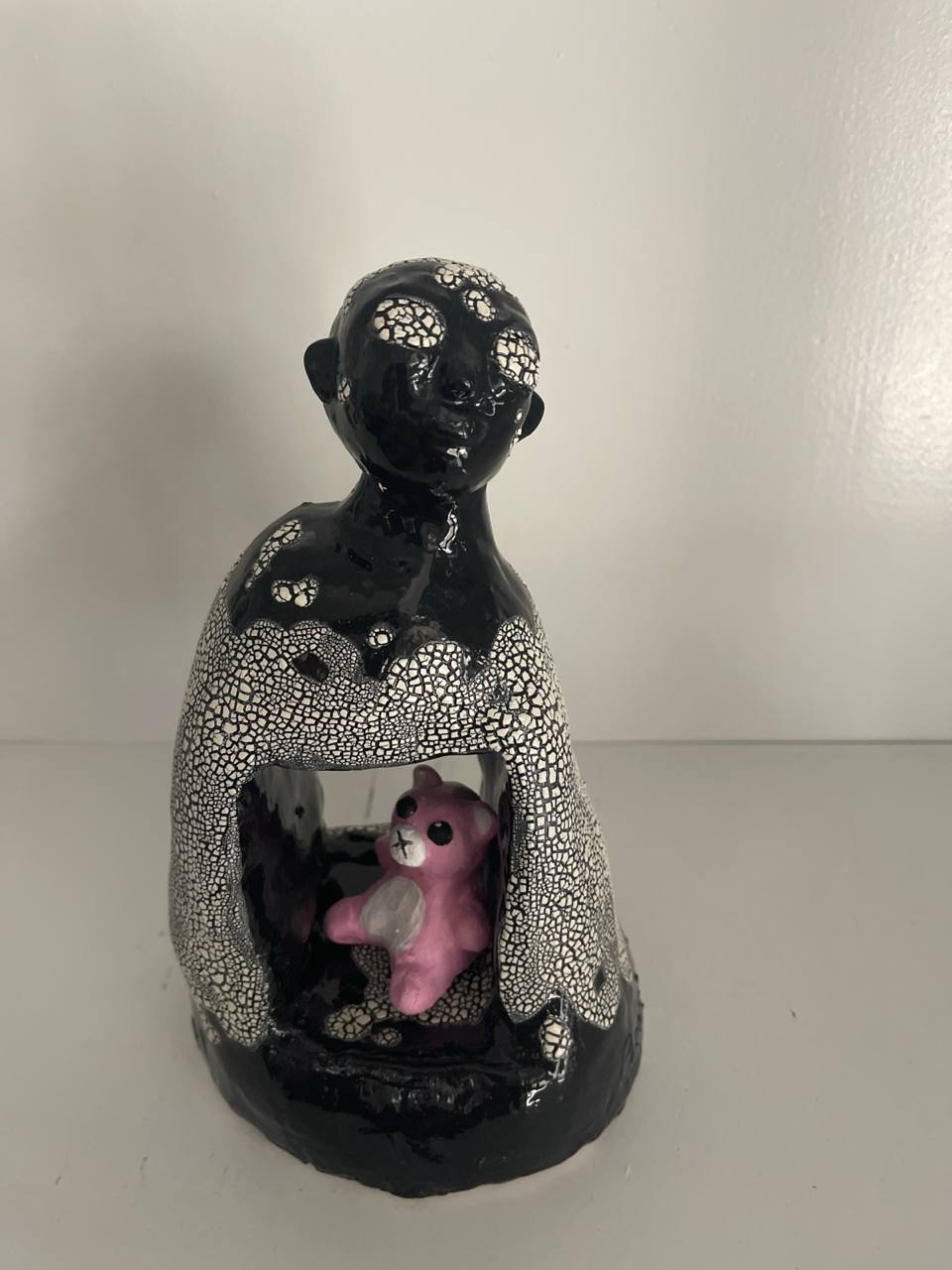 Inner Child - Ceramic figure with crackle glaze containing pink bear